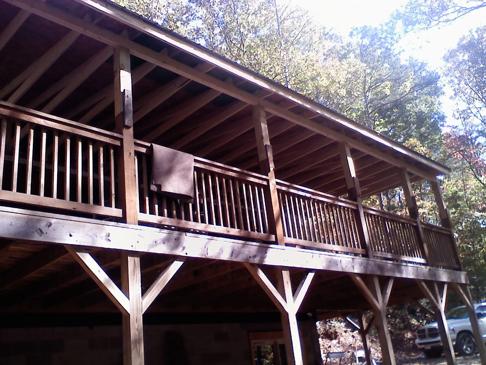 Timber framing under a new elevated porch and deck — Roof Leak Repair in East Walpole by Roofing Brothers